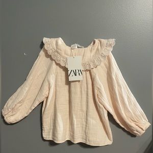 Cream pink long sleeve button down shirt with peter-pan collar